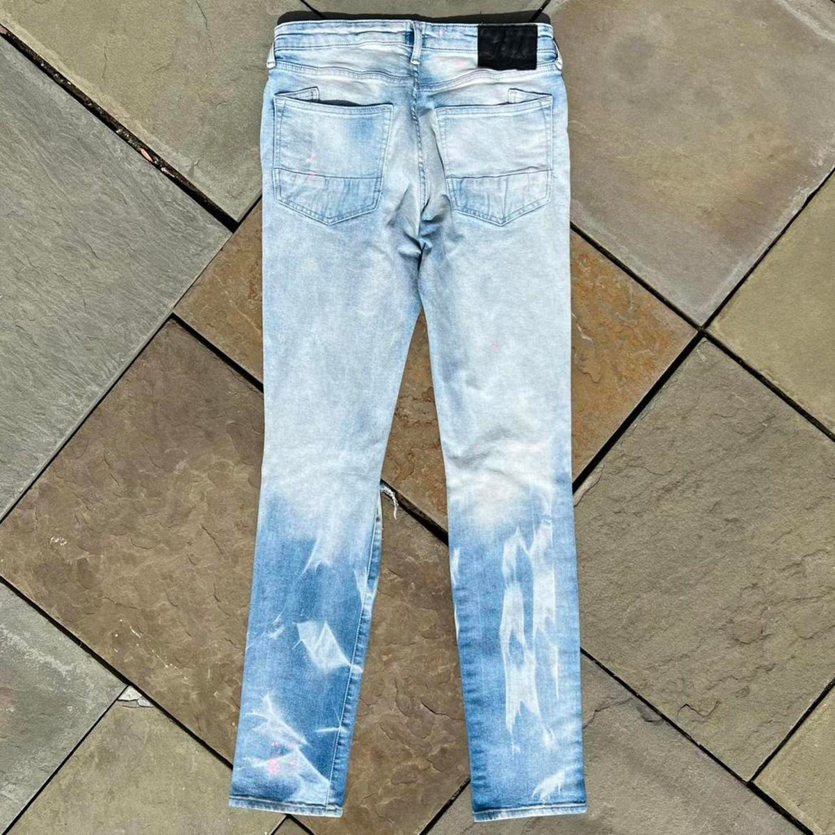Distressed Pink Paint Splatter Ripped Light Wash Slim Jeans