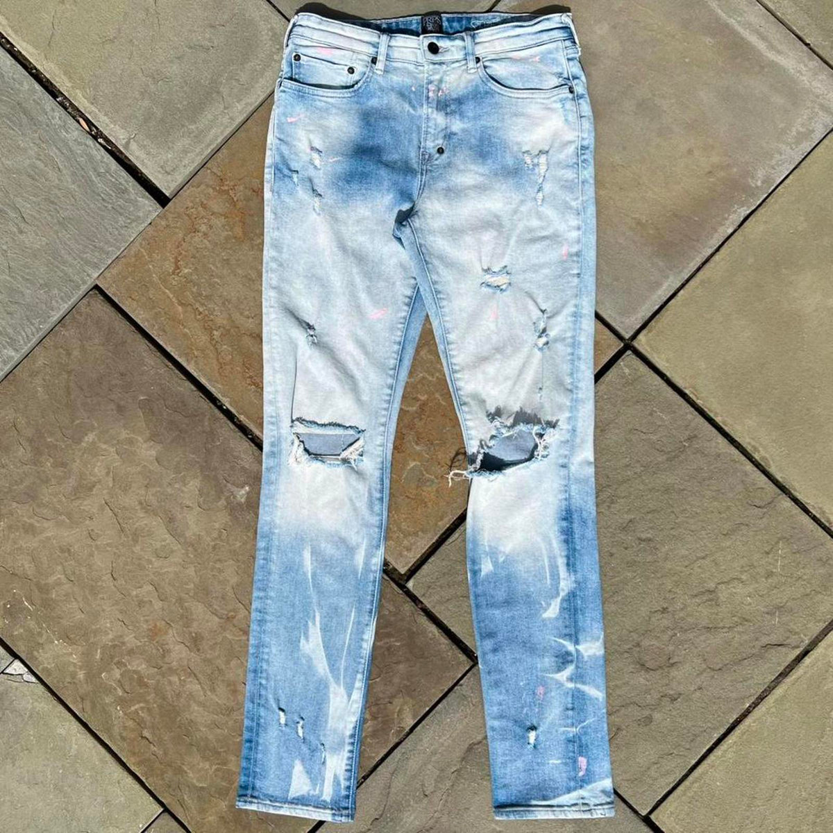 Distressed Pink Paint Splatter Ripped Light Wash Slim Jeans