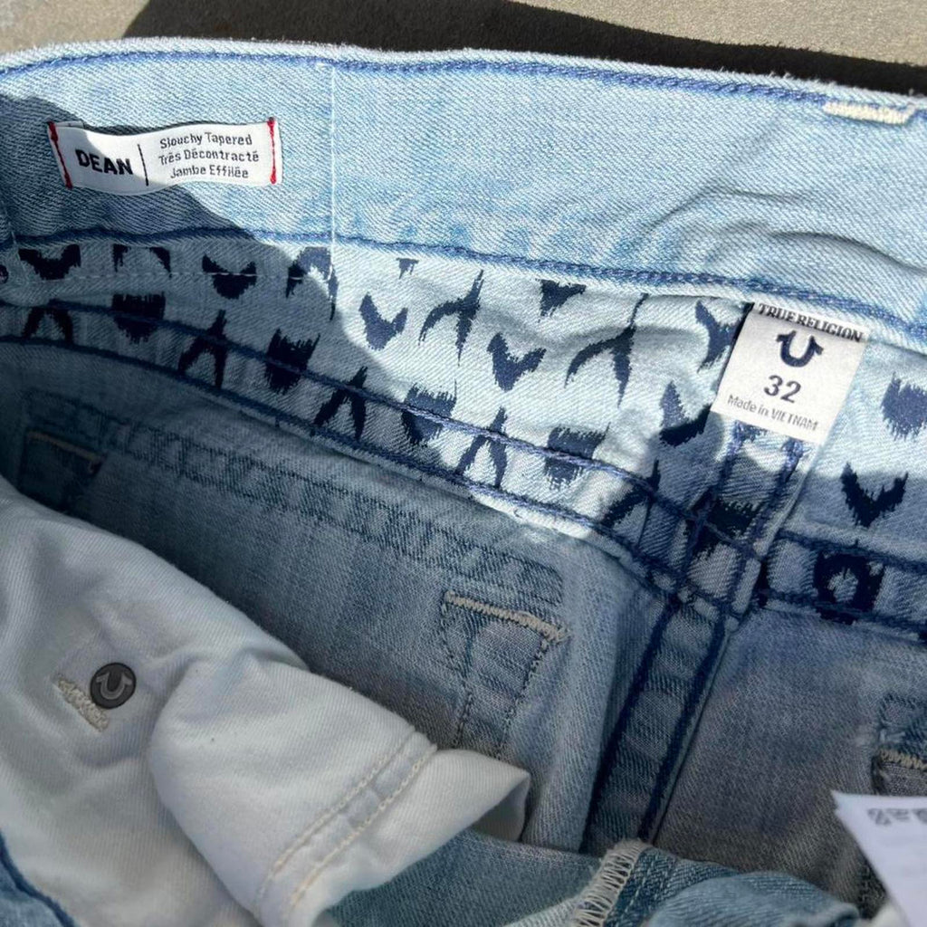 True Religion Distressed Light Wash Slouchy Tapered Jeans 32