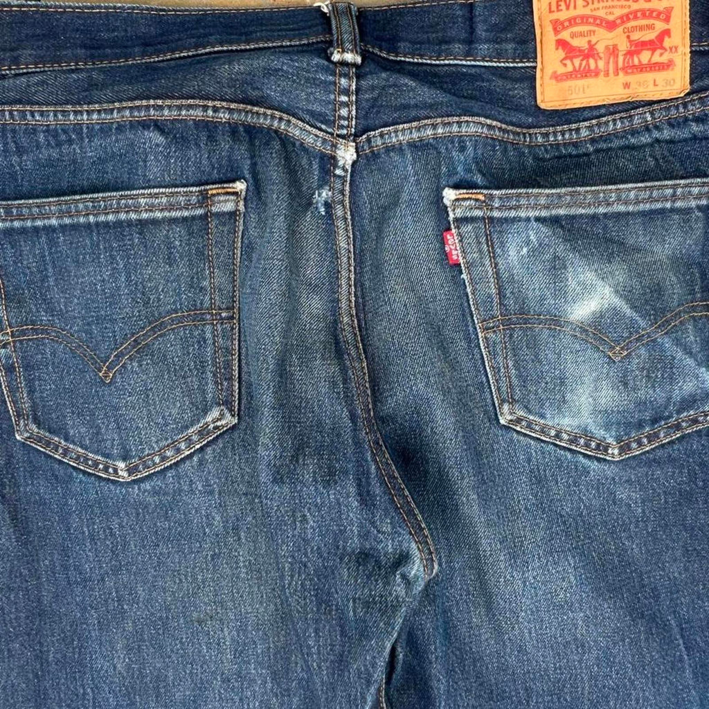 Naturally Distressed Dark Indigo Wash Levi’s Denim 501 Jeans