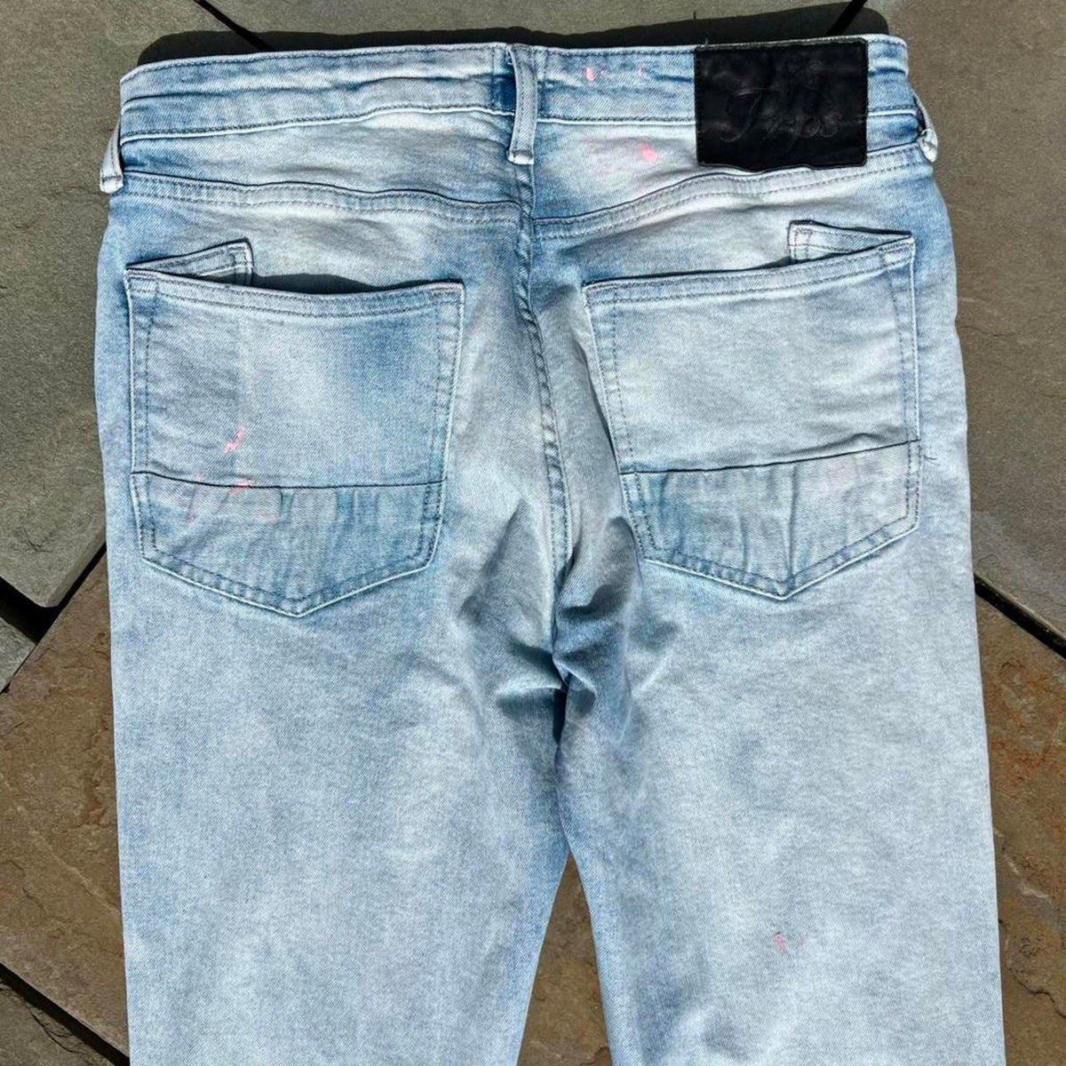 Distressed Pink Paint Splatter Ripped Light Wash Slim Jeans