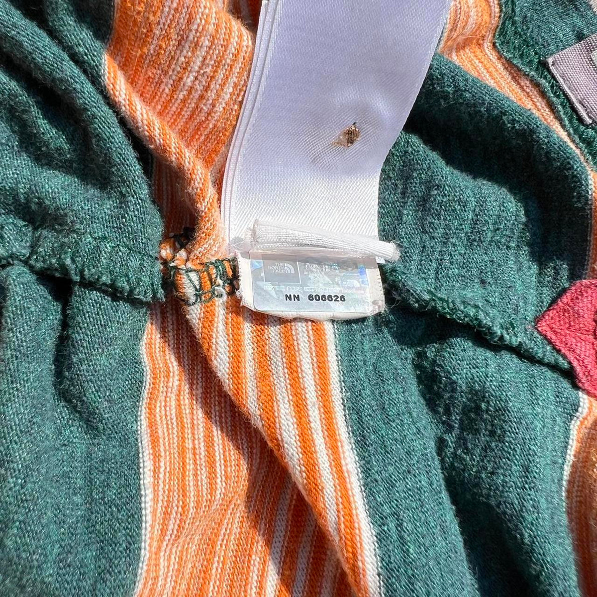 The North Face Orange and Green Striped Polo